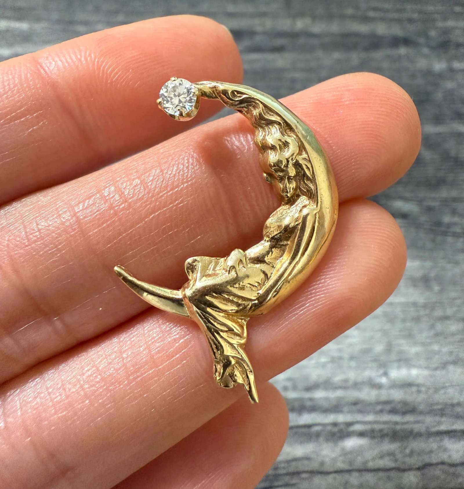 Vintage Diamond and 14K Gold Woman on the Moon Pendant: Metal: 14K Yellow Gold Weight: 3.9 gramsDiamond: Approximately 0.15 caratsMeasurements: 1.35 inches long by 0.8 inches wideMarkings: "14K"Condition: In very good condition with some minor surface wear