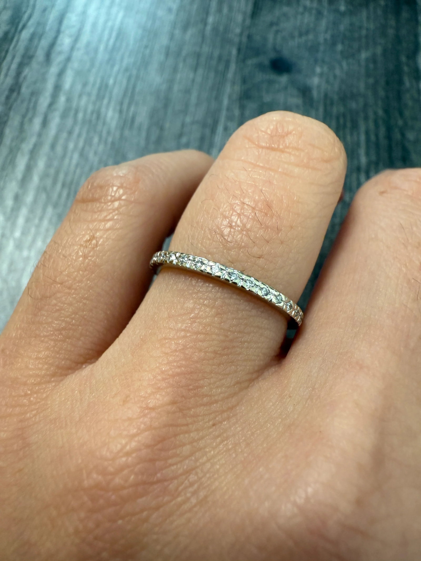 Diamond and 14K White Gold Eternity Band, Size 6.5: Metal: 14K White Gold Weight: 1.5 gramsRing Size: 6.5 Wide: 1.5 mm wideDiamonds: Approximately 0.17 caratsMarkings: "585"Condition: In very good condition with some minor surface wear consistent with 