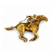 1960’s 18K Yellow Gold Horse & Jockey Brooch: Vintage 1960s figural brooch sculpted in 18K yellow gold, depicting a detailed horse and jockey motif.