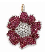DAVID WEBB 18K & Platinum Burma Ruby and Diamond Flower Brooch/Pendant: Iconic signed David Webb masterwork convertable brooch/pendant, structured in 18K gold and platinum with fine Burma rubies and white diamond floral clusters.
