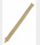 FRENCH 18K Yellow & White Gold Diamond Bracelet: Classic French estate links bracelet designed with an elegant contrast of 18K yellow and white gold elements, pave-set with diamonds.