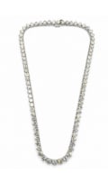 14K White Gold 19.30 Ct. Diamond Necklace: Magnificent line necklace structured in 14K white gold, beautifully set with 19.30 carats of graduated diamonds.