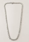 18K White Gold 40.00 Ct. Graduated Diamond Riviera Necklace: Showstopping graduated Riviera collar necklace in 18K white gold, expertly set with 40.00 carats of fine diamonds.