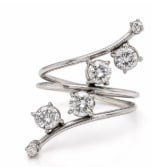 18K White Gold 1.25 Ct. Diamond Ring: Classic cluster or anniversary style ring worked in 18K white gold set with 1.25 carats of brilliant diamonds.