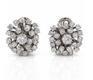 1960’s Platinum 2.75 Ct. Diamond Earrings: Vintage 1960s estate cluster earrings structured in premium platinum with a total of 2.75 carats of brilliant diamonds.