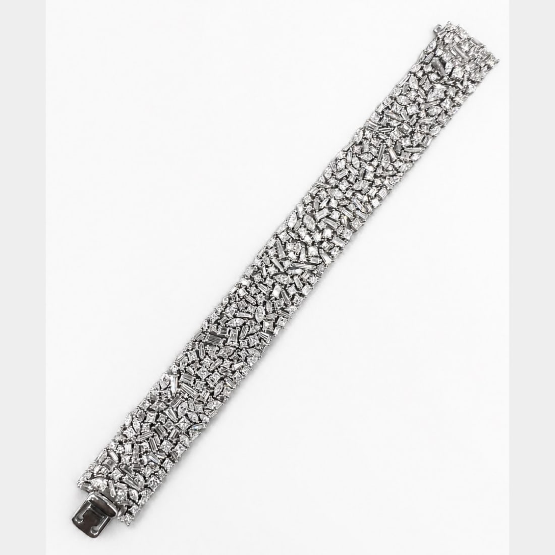 Platinum 36.00 Ct. Diamond Bracelet: Spectacular high-carat line bracelet tailored in premium platinum, featuring an exceptional 36.00 carats of uniform diamonds.
