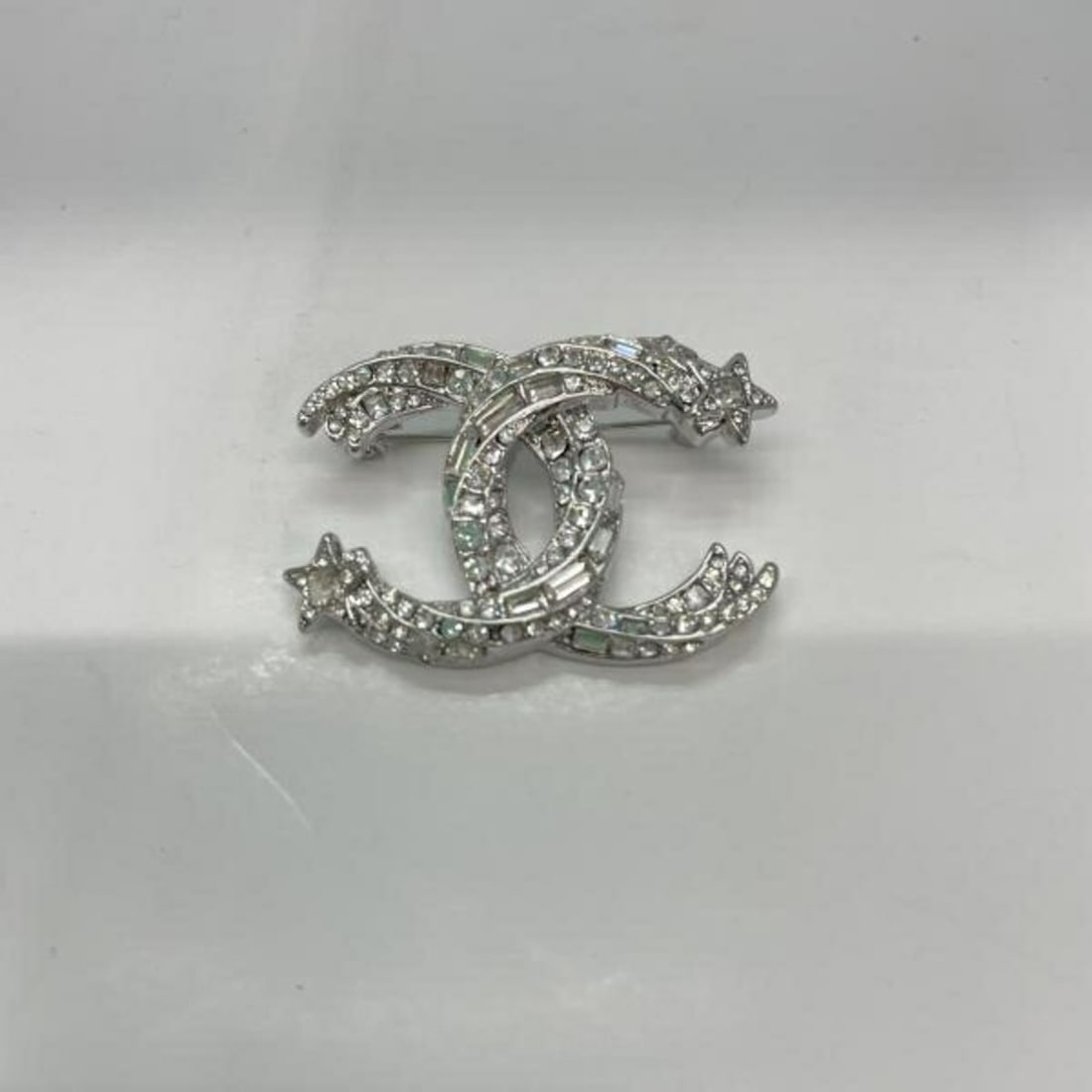 CHANEL Brooch, Coco Mark Star, Silver, Chanel: --- Catalog ---Category: DesignType: BroochColor: SilverGender: WomenCategory: GeneralBrand: Chanel--- Item List ---Section: ConditionRanking: Rank B Used - Traces of usage, damages / dirt can be seen