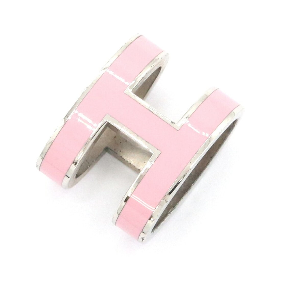 Hermes Pop H Pink Silver Metal Pendant Top Necklace for Women: --- Catalog ---Category: SizePendant Size: 16mm x 12mm / 0.62'' x 0.47''Category: DesignColor: Pink, SilverGender: WomenMaterial: MetalNecklace Type: PendantCategory: GeneralBrand: Hermes--- Item List