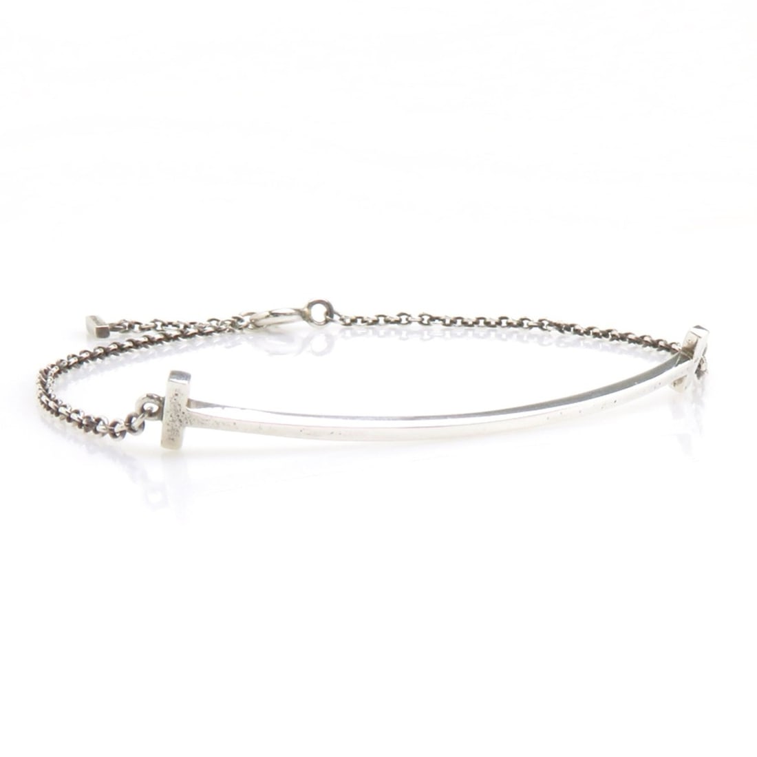 Tiffany & Co. T Smile Bracelet, Sterling Silver 925, Women's, h32281k: --- Catalog ---Category: SizeLength: 16.5cm / 6.49''Total Length: 18cm / 7.08''Category: DesignType: Charm braceletColor: SilverGender: WomenMaterial: Silver 925Category: GeneralBrand: Tiffany--- Item