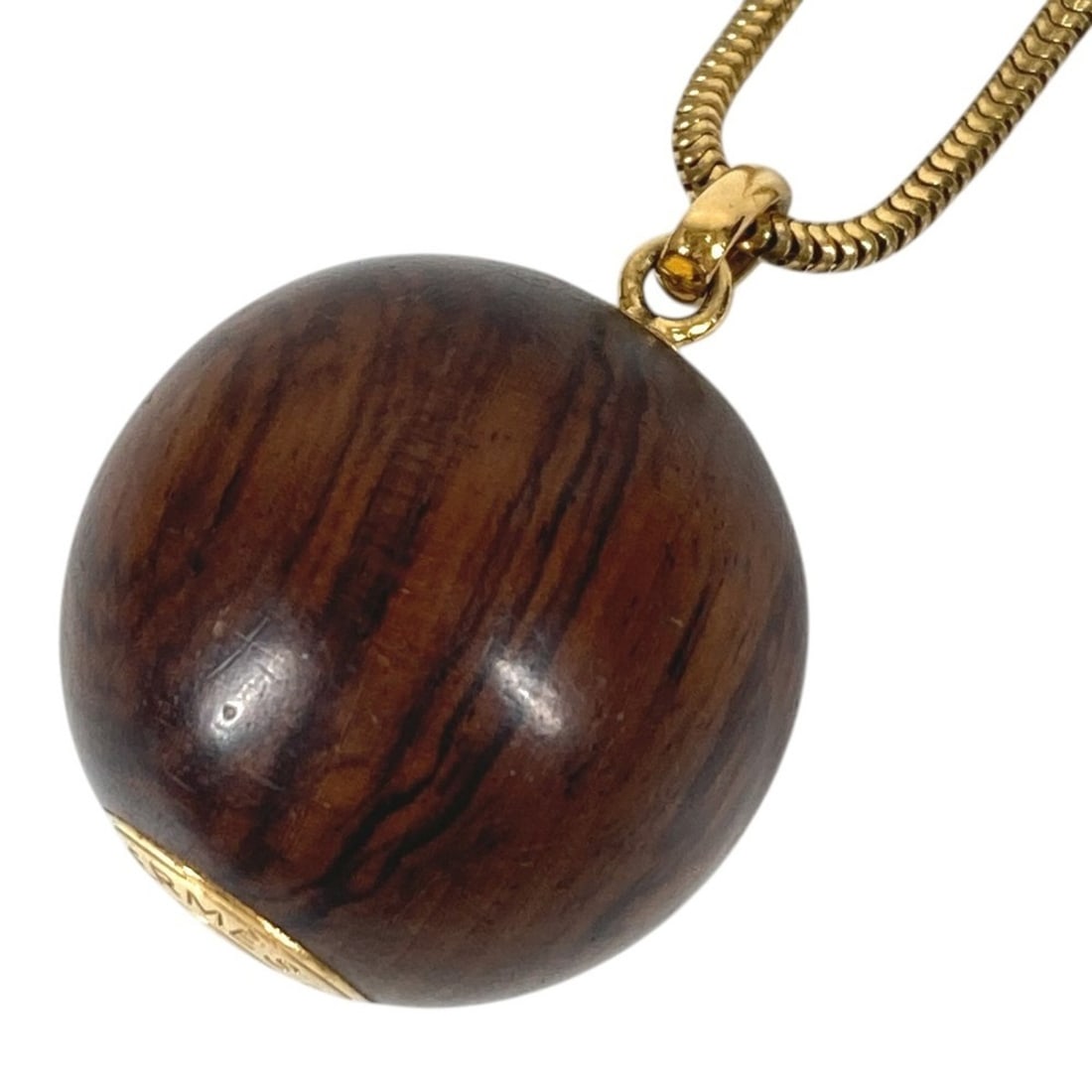 HERMES Hermes Accessories Sellier Logo Wood Ball Chain Necklace Pendant Accessory Metal Men's: --- Catalog ---Category: SizeNeck Circumference: 65.5 cm / 25.78''Category: DesignColor: Brown, GoldGender: Men,WomenMaterial: Metal, WoodNecklace Type: NecklaceCategory: GeneralBrand: Hermes--- Item 