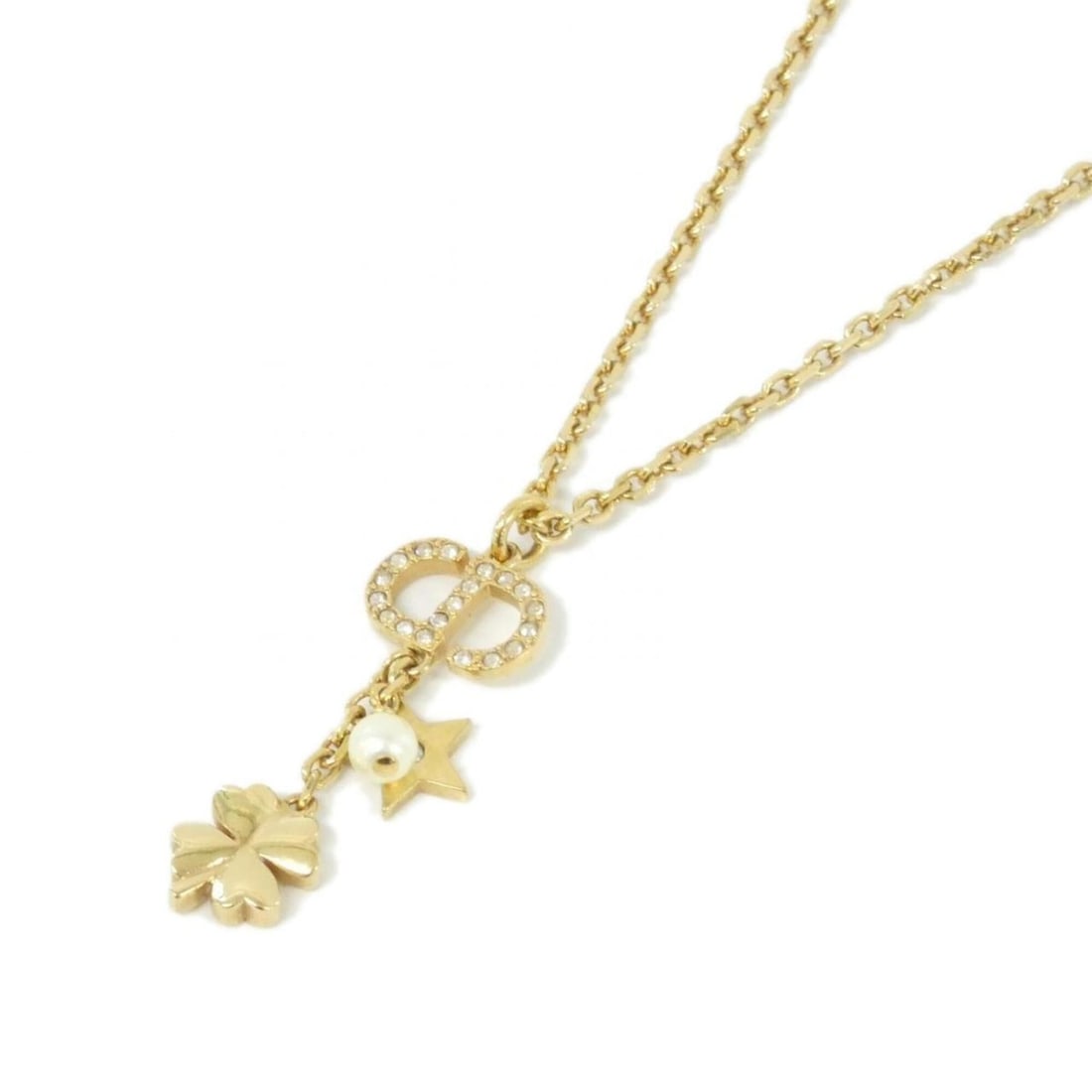 Christian Dior Petite CD N3128WOMCY Necklace: --- Catalog ---Category: SizePendant Size: 30mm x 12mm / 1.18'' x 0.47''Neck Circumference: 38 cm - 41 cm / 14.96'' - 16.14''Category: DesignColor: Clear, Gold, WhiteGender: WomenNecklace Type: