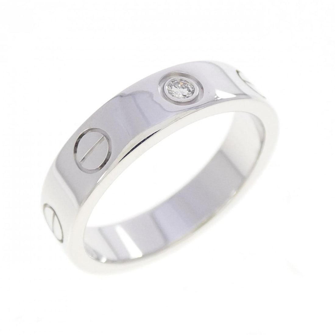 Cartier Mini Love 1P Ring: --- Catalog ---Category: SizeUS Size: 4Brand Size: 47Category: DesignType: Band ringColor: White goldStone: DiamondGender: WomenMaterial: White gold (18K)Category: GeneralMPN: B4050500Brand: Cartier--
