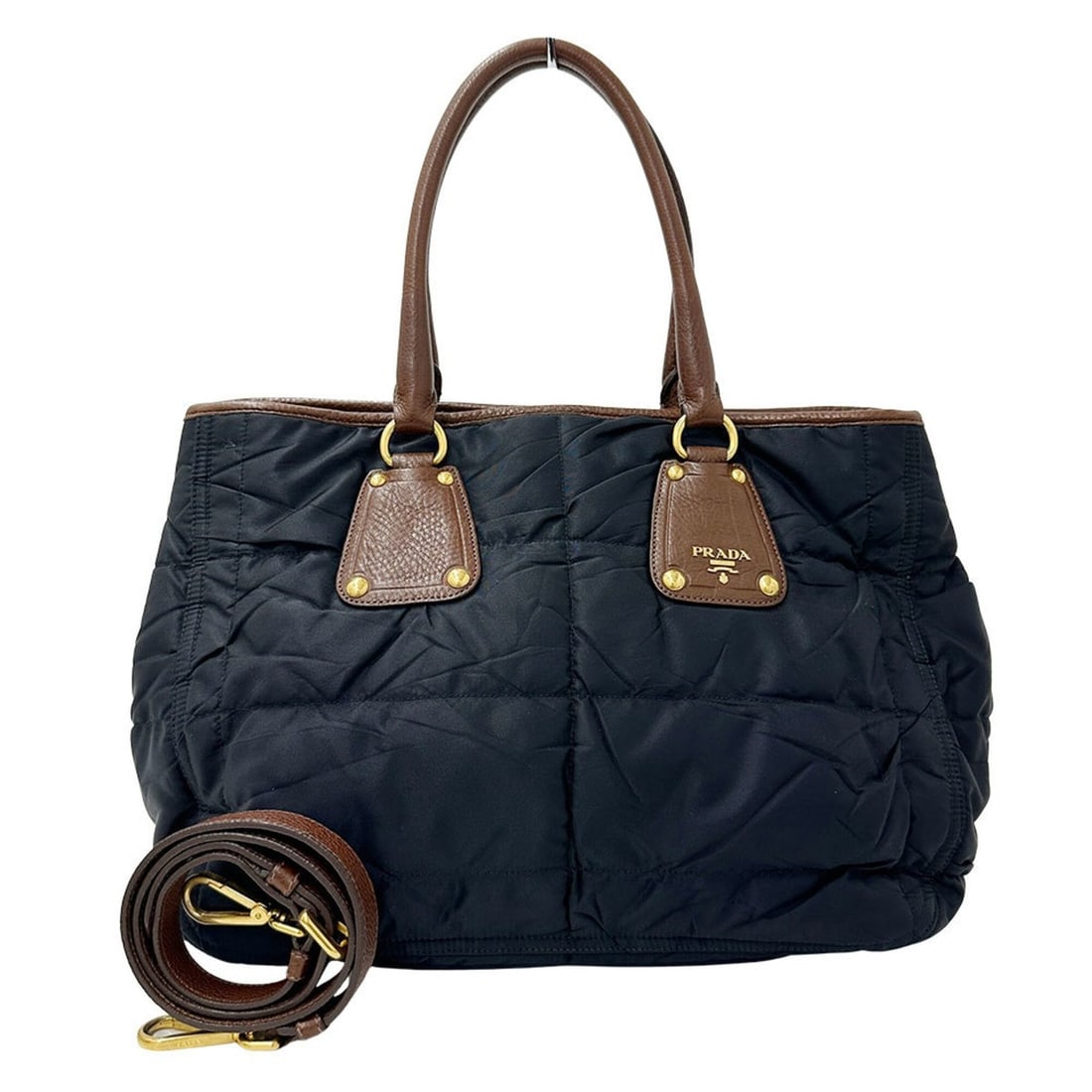 Prada handbag for women and men, brand name, handbag/shoulder bag, 2-way, nylon/leather, black.: --- Catalog ---Category: SizeSize (HxWxD): 26cm x 36cm x 19cm / 10.23'' x 14.17'' x 7.48''Category: DesignType: Handbag, Shoulder bagColor: BlackGender: Men,WomenMaterial: Nylon , Leather Category: Ge