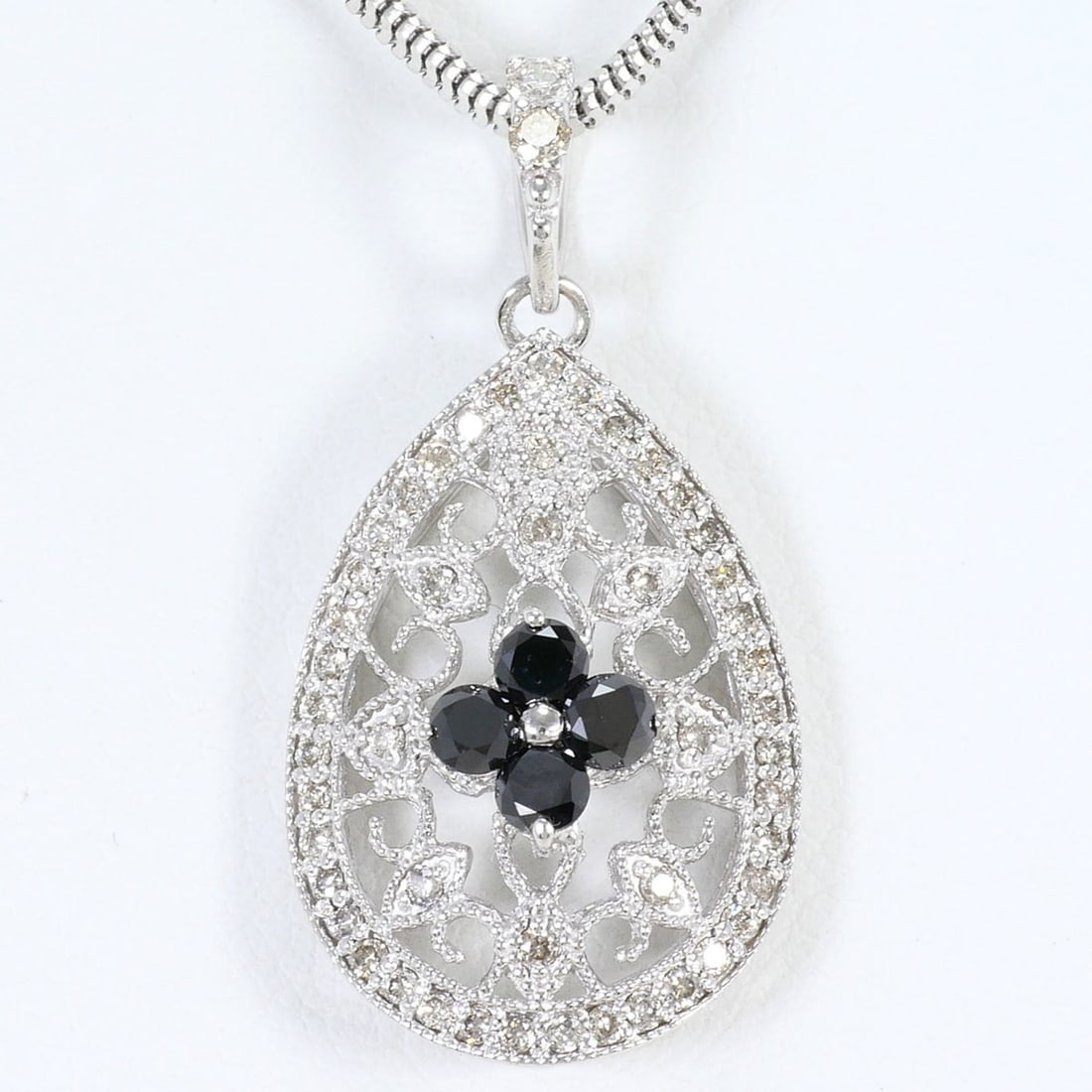 18K (18-karat white gold) necklace with black diamonds. Comes a diamond appraisal certificate. Total: --- Catalog ---Category: SizeWeight: 8.1g / 0.28oz.Pendant Size: 27mm x 14mm / 1.06'' x 0.55''Neck Circumference: 45 cm / 17.71''Category: DesignColor: Black, White goldMetal: White GoldStone: Diamond