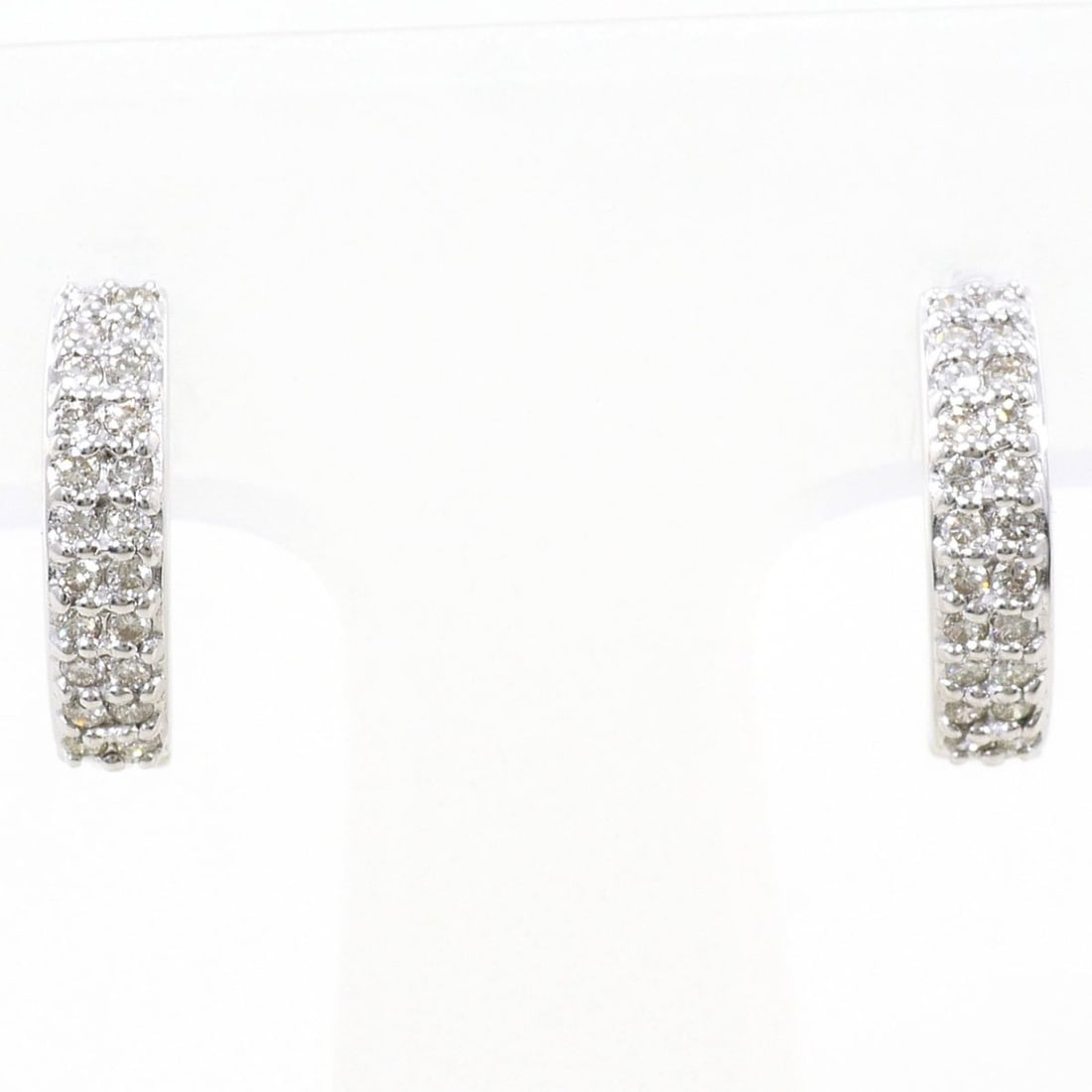 18K (18-karat white gold) earrings with 0.13ct diamonds, includes a certificate of authenticity,: --- Catalog ---Category: SizeWeight: 3g / 0.1oz.Category: DesignType: Hoop earringsColor: White goldMetal: White GoldStone: DiamondGender: WomenMaterial: White gold (18K)Metal Purity: 18KWeight (ct.):