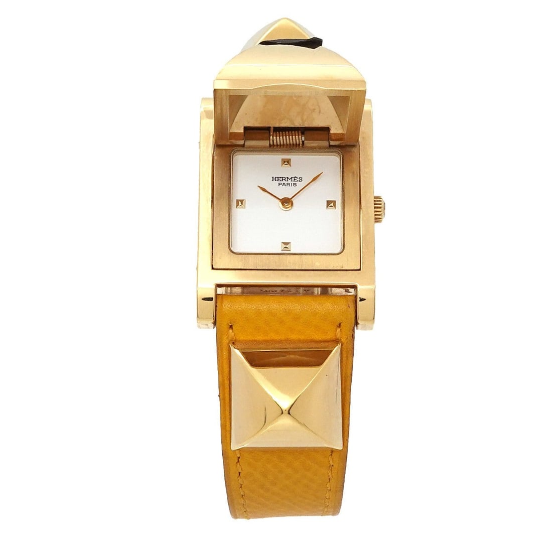 Hermes Medor Women's Watch, Pyramid Design, Gold Studs, White and Yellow Leather Strap, Quartz: --- Catalog ---Category: SizeWrist Size: 13.5cm - 16cm / 5.31'' - 6.29''Case Diameter: 23mm / 0.91''Category: DesignType: WristwatchGender: WomenColor (Dial): WhiteMaterial (Band): Gold plated, Leathe
