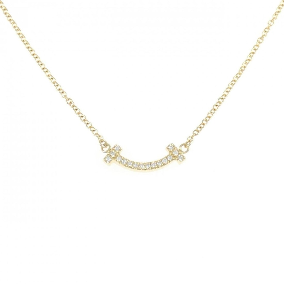 Tiffany T Smile Mini Necklace: --- Catalog ---Category: SizePendant Size: 3.6mm x 14.4mm / 0.14'' x 0.56''Neck Circumference: 41 cm - 46 cm / 16.14'' - 18.11''Category: DesignGender: WomenMaterial: Yellow gold (18K)Pendant Type: