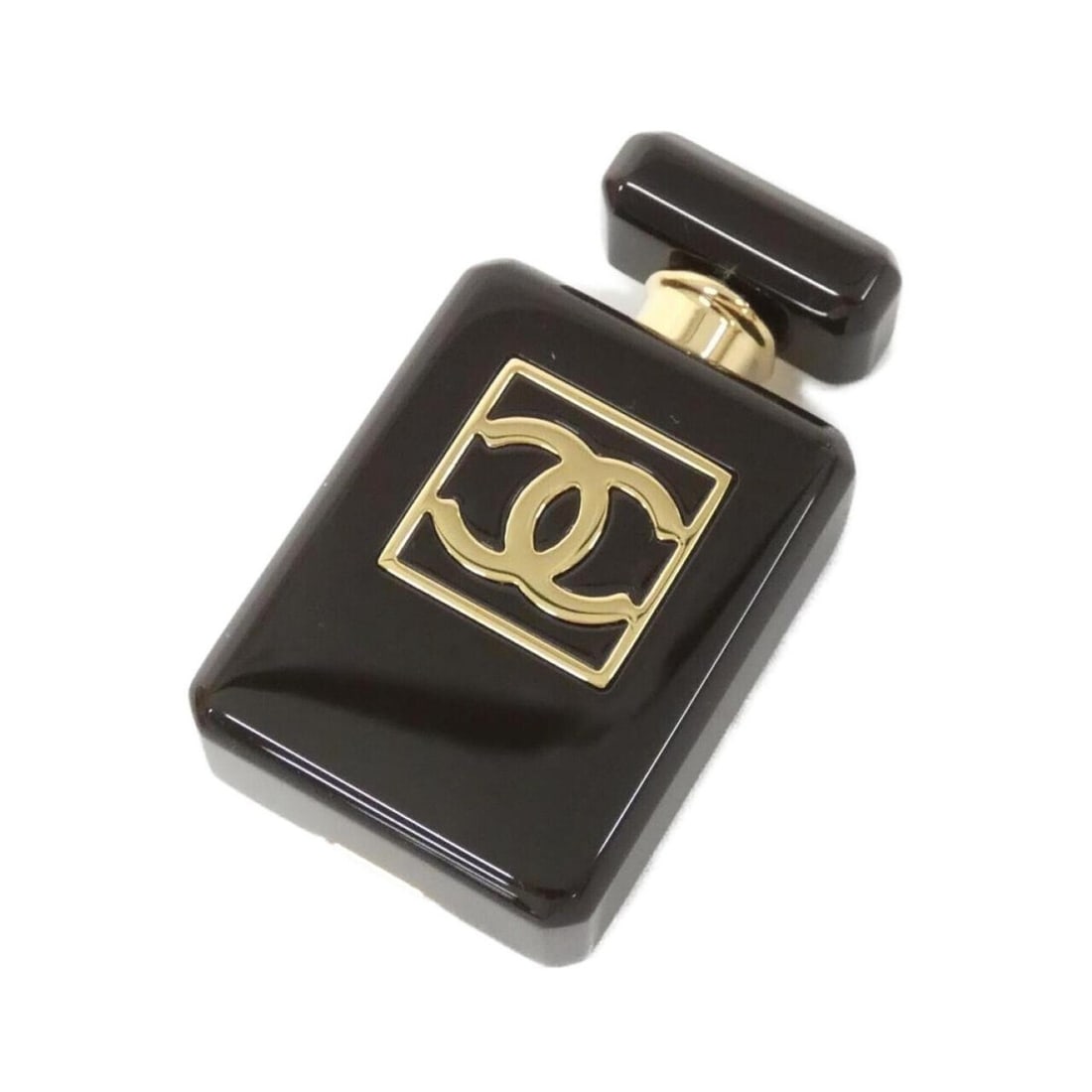 Chanel ABA987 Brooch: --- Catalog ---Category: SizeSize (HxWxD): 4.3cm x 2.4cm / 1.69'' x 0.94''Category: DesignType: BroochColor: Brown, GoldGender: WomenCategory: GeneralMPN: ABA987Brand: Chanel--- Item List ---Section: