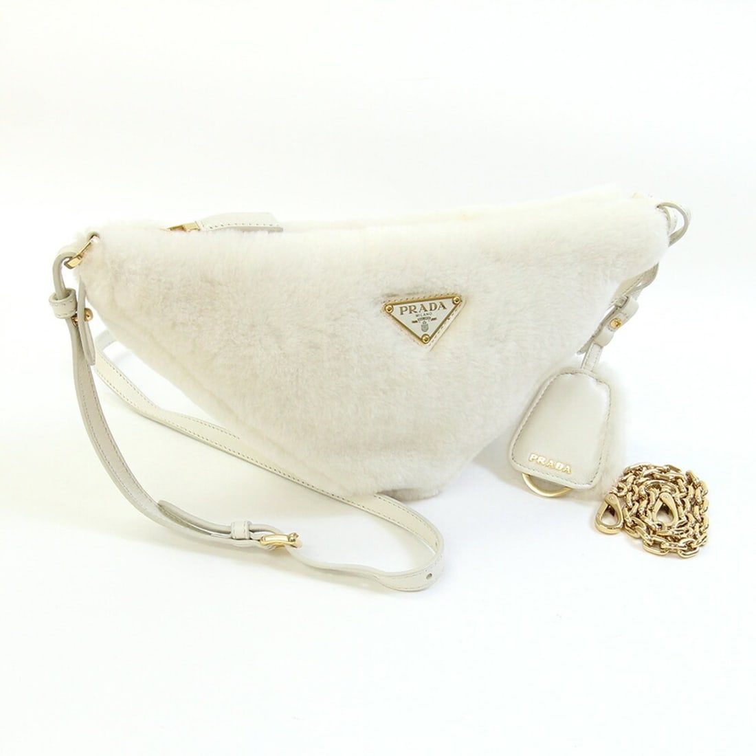 Prada Shoulder Bag, Off-White, Fur, Leather, Crossbody, Triangle Chain Shoulder, Women's PRADA: --- Catalog ---Category: SizeSize (HxWxD): 15cm x 28cm x 5cm / 5.9'' x 11.02'' x 1.96''Category: DesignType: Shoulder bagColor: Off-white, YellowGender: WomenMaterial: Fur , Leather Category: