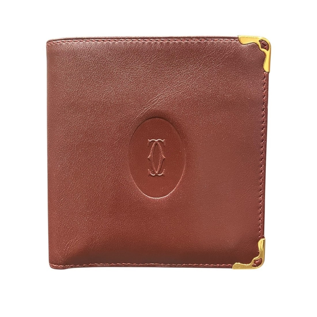 Cartier Must de Bi-fold Wallet, Line, Calf Leather, 7 318 4 192: --- Catalog ---Category: SizeSize (HxWxD): 10cm x 9.5cm x 2cm / 3.93'' x 3.74'' x 0.78''Category: DesignType: Wallet (bi-fold)Color: Wine redGender: Women,MenMaterial: Leather Leather/Fur Type: Calfsk