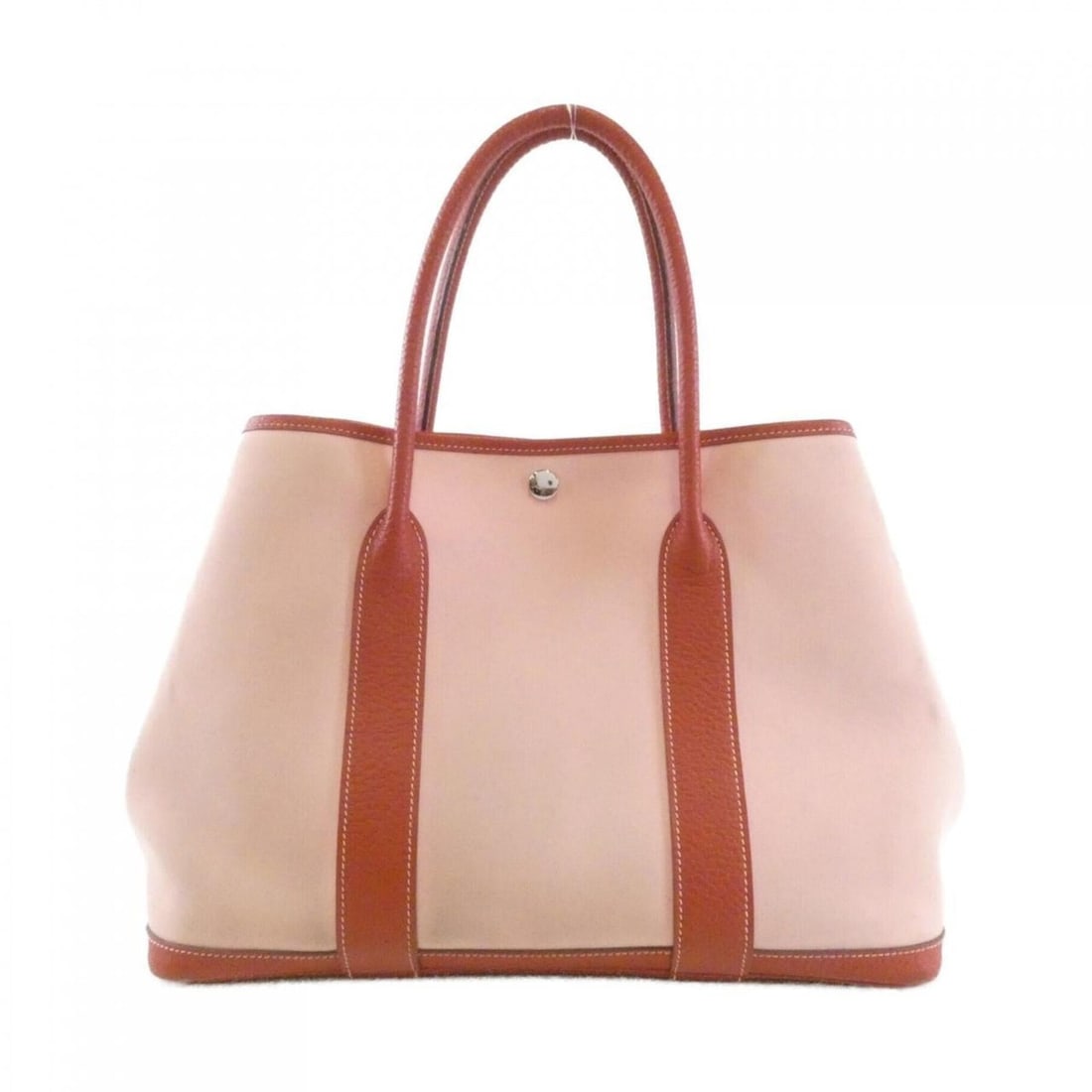 Hermes Garden Party 36cm 065867CK Handbag: --- Catalog ---Category: SizeSize (HxWxD): 26cm x 36cm x 18cm / 10.23'' x 14.17'' x 7.08''Category: DesignType: HandbagColor: Rose sakuraGender: WomenMaterial: Country leather , Toile officier