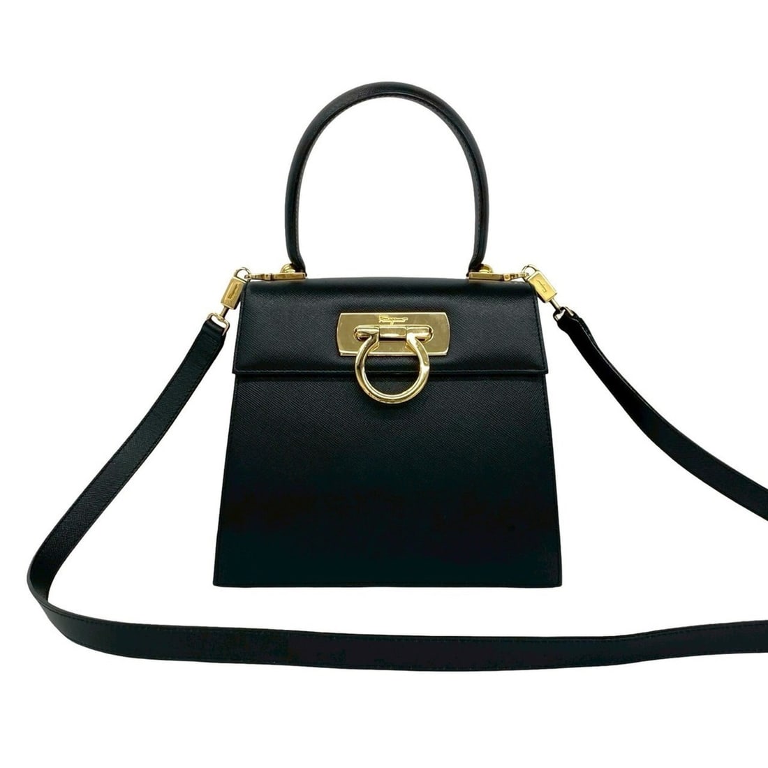 Salvatore Ferragamo Gancini Hardware Leather 2-way Handbag/Shoulder Bag Black 42395: --- Catalog ---Category: SizeSize (HxWxD): 18cm x 20cm x 9cm / 7.08'' x 7.87'' x 3.54''Category: DesignType: Handbag, Shoulder bagColor: BlackGender: WomenMaterial: Leather Category: GeneralBrand: Sal
