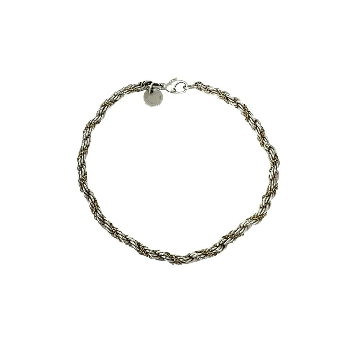 TIFFANY&Co. Tiffany Vintage Twist Rope Bracelet, Sterling Silver 925, 18K Yellow Gold, Silver, 19936: --- Catalog ---Category: SizeLength: 18.4cm / 7.24''Category: DesignType: Charm braceletColor: Gold, SilverGender: WomenMaterial: Silver 925, Yellow gold (18K)Category: GeneralBrand: Tiffany--- Item L