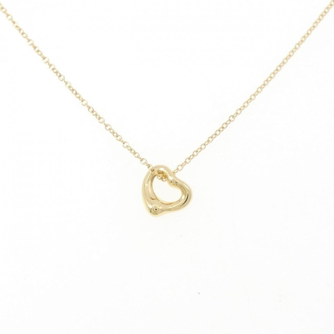 Tiffany Open Heart Necklace: --- Catalog ---Category: SizePendant Size: 6.7mm x 7mm / 0.26'' x 0.27''Neck Circumference: 40 cm / 15.74''Category: DesignGender: WomenMaterial: Yellow gold (18K)Pendant Type: PendantNecklace Type:
