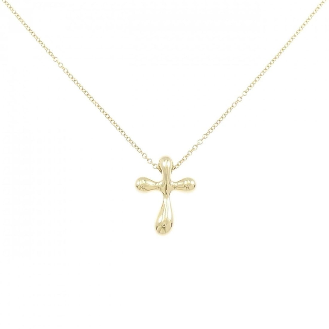 Tiffany Small Cross Necklace: --- Catalog ---Category: SizePendant Size: 15.9mm x 12.2mm / 0.62'' x 0.48''Neck Circumference: 41 cm / 16.14''Category: DesignGender: WomenMaterial: Yellow gold (18K)Pendant Type: PendantNecklace