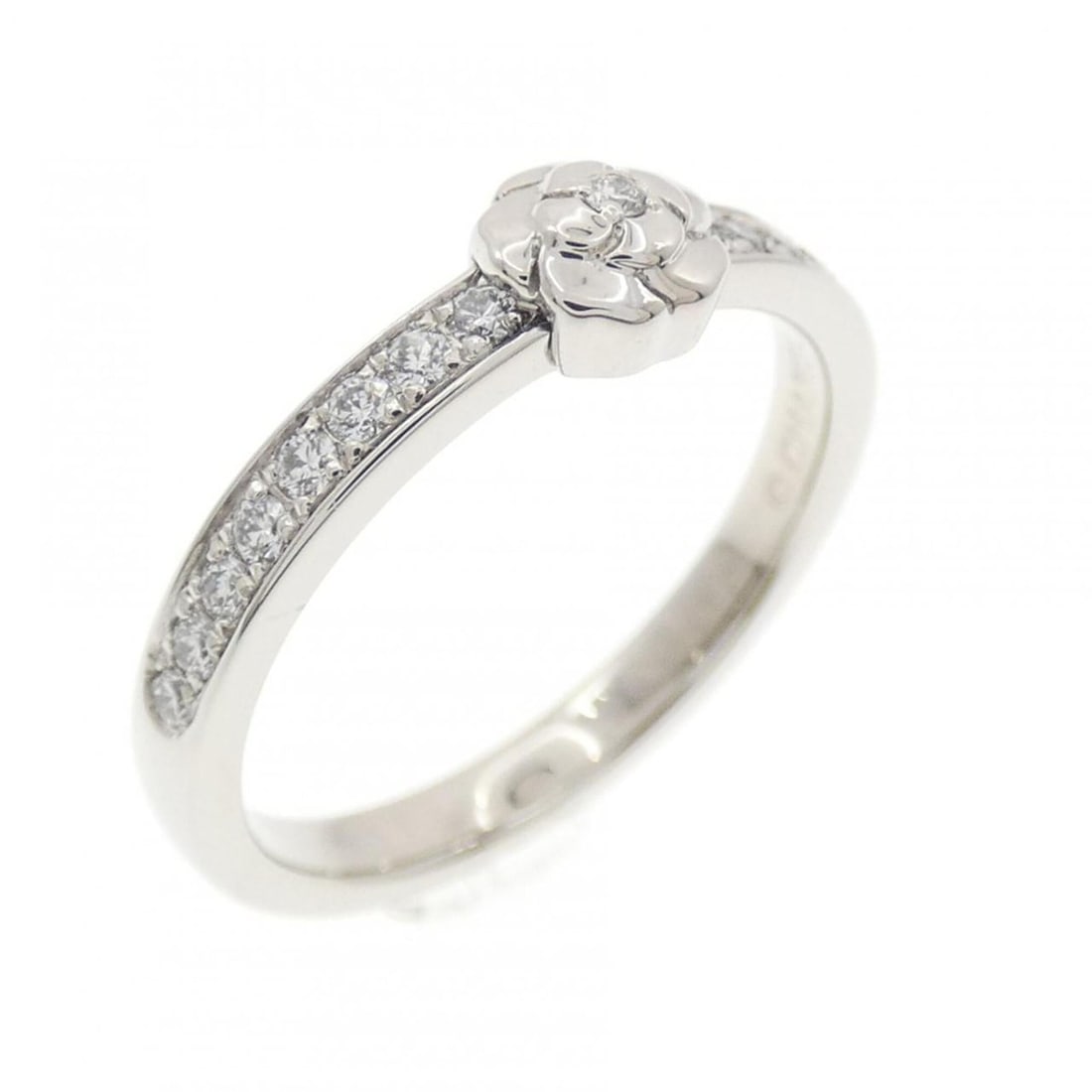 Chanel Camellia Ring: --- Catalog ---Category: SizeUS Size: 5Brand Size: 49Category: DesignType: Band ringStone: DiamondGender: WomenMaterial: Platinum 950Category: GeneralMPN: J11885Brand: Chanel--- Item List ---Section: