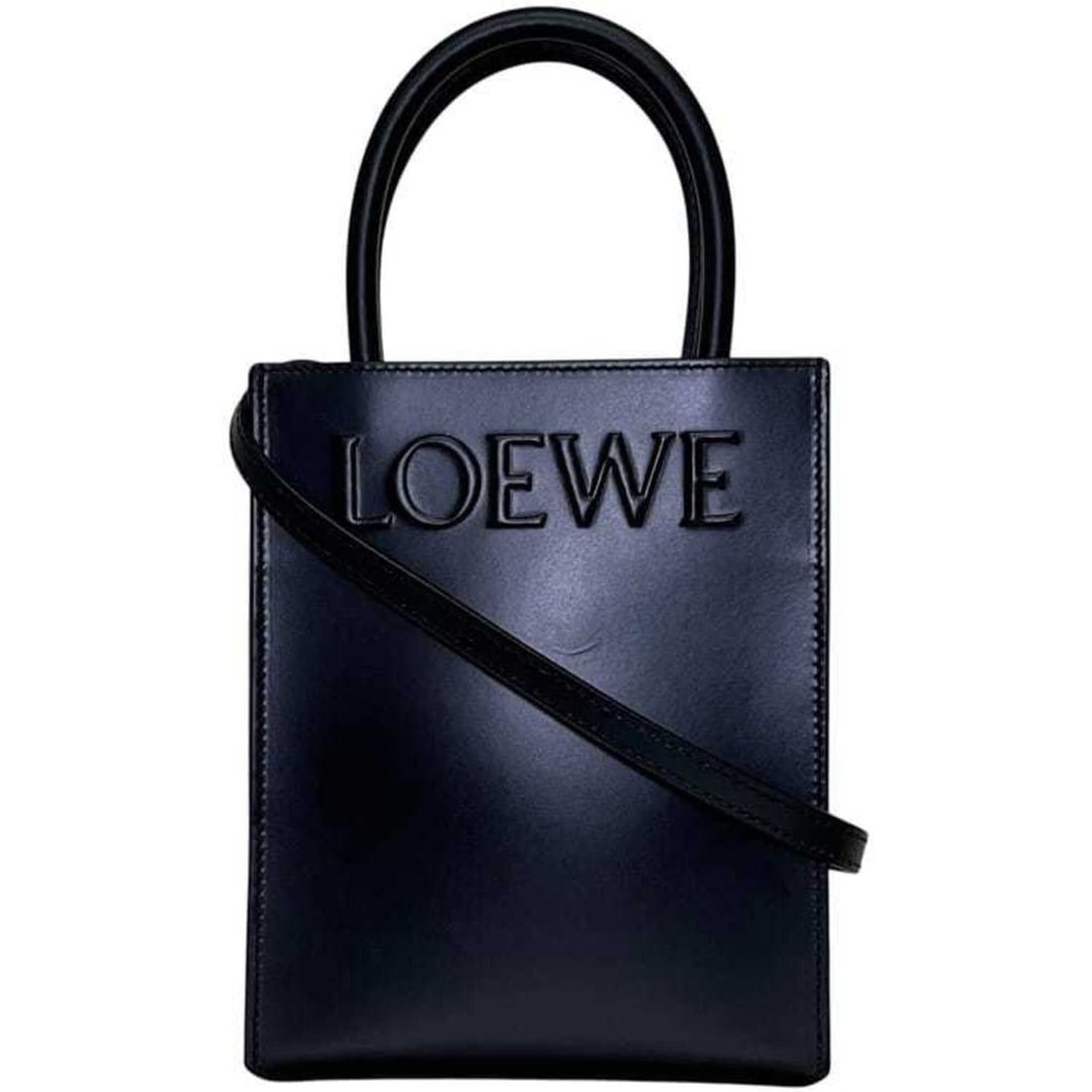 Loewe 2-way Standard A5 Tote Bag, Black A933S30X01, Crossbody, Calf Leather, 652336 LOEWE: --- Catalog ---Category: SizeSize (HxWxD): 21cm x 17cm x 6cm / 8.26'' x 6.69'' x 2.36''Category: DesignType: Tote bagColor: BlackGender: WomenMaterial: Leather Leather/Fur Type: CalfskinCategory: Gene
