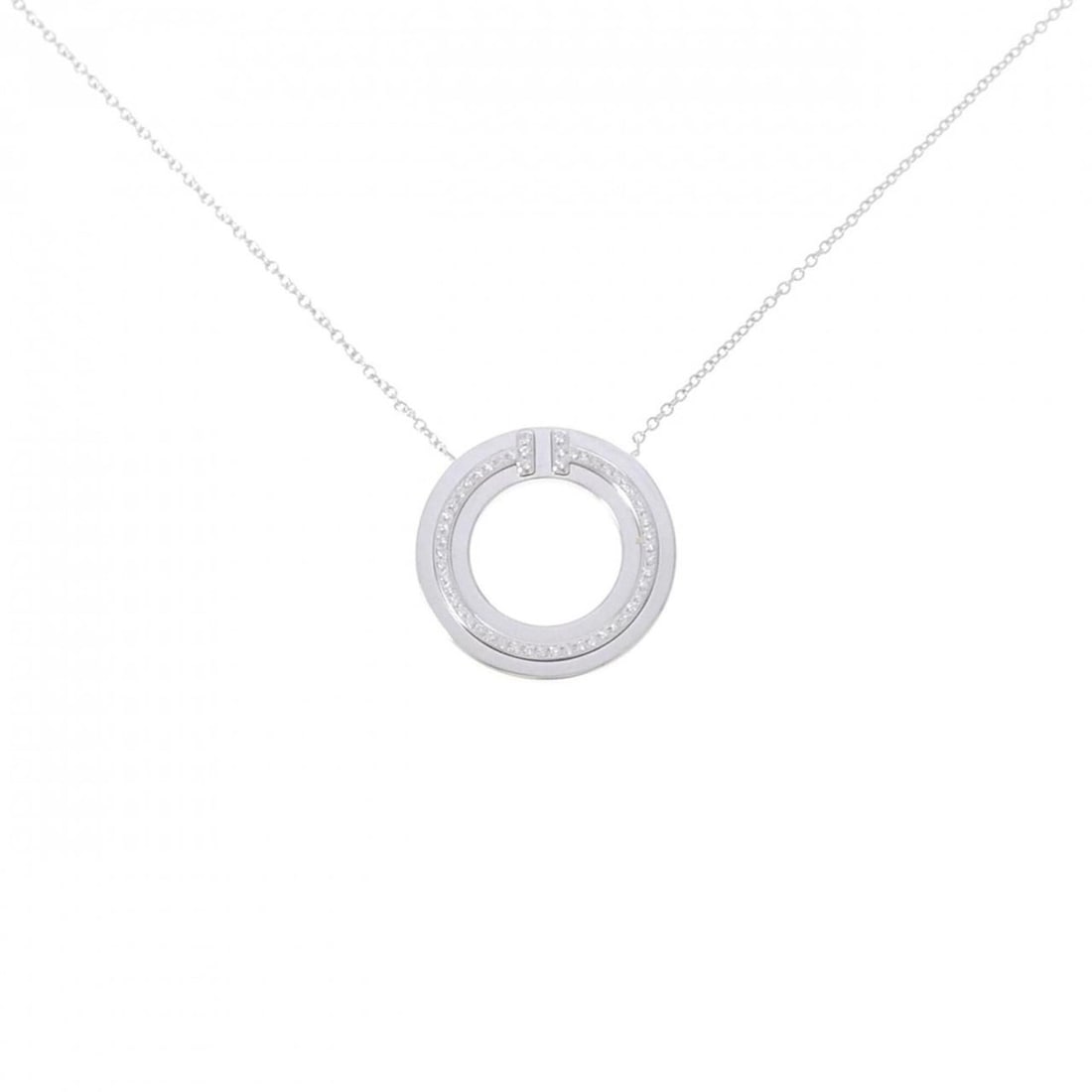Tiffany T Circle Necklace: --- Catalog ---Category: SizeWeight: 6.7g / 0.23oz.Diameter: 20.2mm / 0.79''Neck Circumference: 4 cm / 1.57''Category: DesignMetal: White GoldStone: DiamondGender: WomenMetal Purity: 18KNecklace Type: