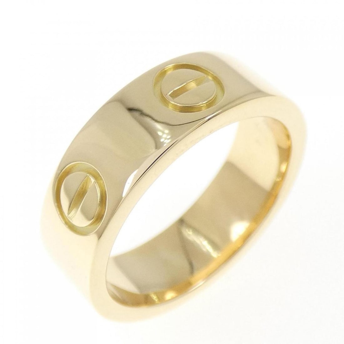 Cartier Love Ring: --- Catalog ---Category: SizeUS Size: 4.5Brand Size: 48Category: DesignType: Band ringGender: WomenMaterial: Yellow gold (18K)Category: GeneralBrand: Cartier--- Item List ---Section: ConditionRanking: