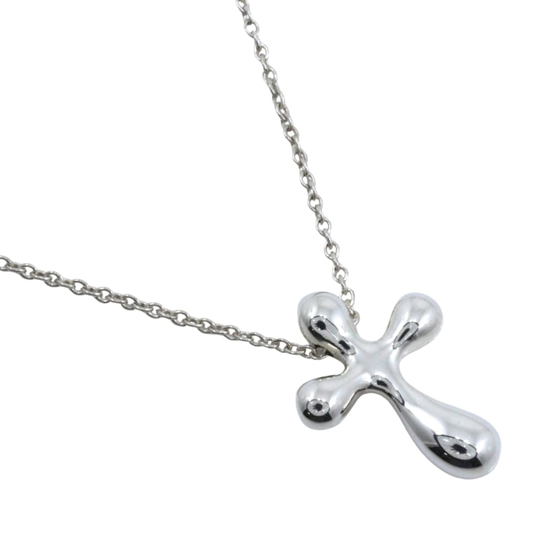 Tiffany & Co. Small Cross Necklace, Elsa Peretti design, Sterling Silver 925, approximately 2.7g,: --- Catalog ---Category: SizeWeight: 2.7g / 0.09oz.Pendant Size: 16mm x 12mm / 0.62'' x 0.47''Neck Circumference: 44.5 cm / 17.51''Category: DesignGender: WomenMaterial: Silver 925Necklace Type: Neckl