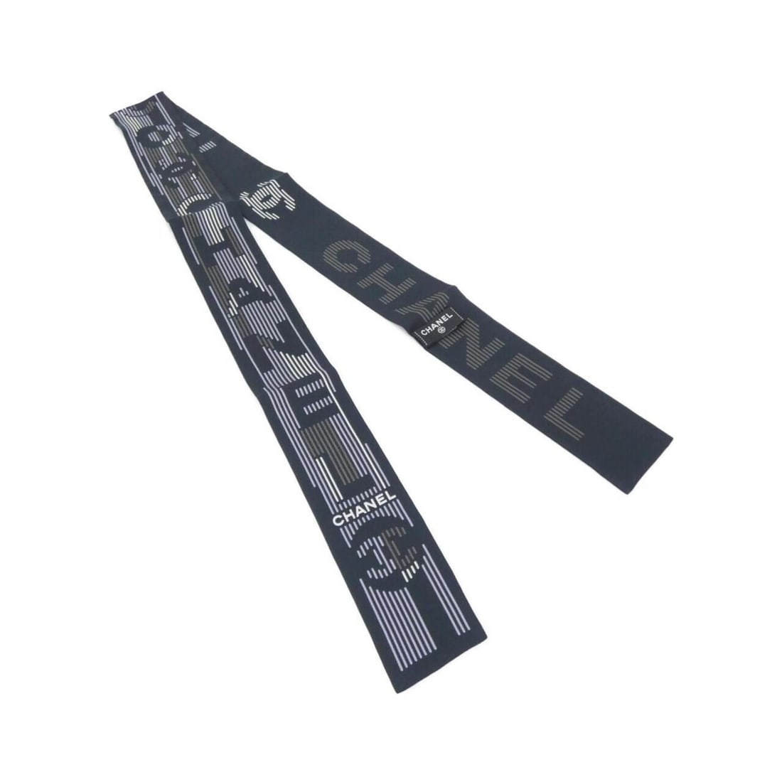 Chanel hairband: --- Catalog ---Category: SizeSize (LxW): 1.2m x 6cm / 47.24'' x 2.36''Category: DesignType: RibbonColor: Black, Multi-colorGender: WomenMaterial: SilkCategory: GeneralBrand: Chanel--- Item List