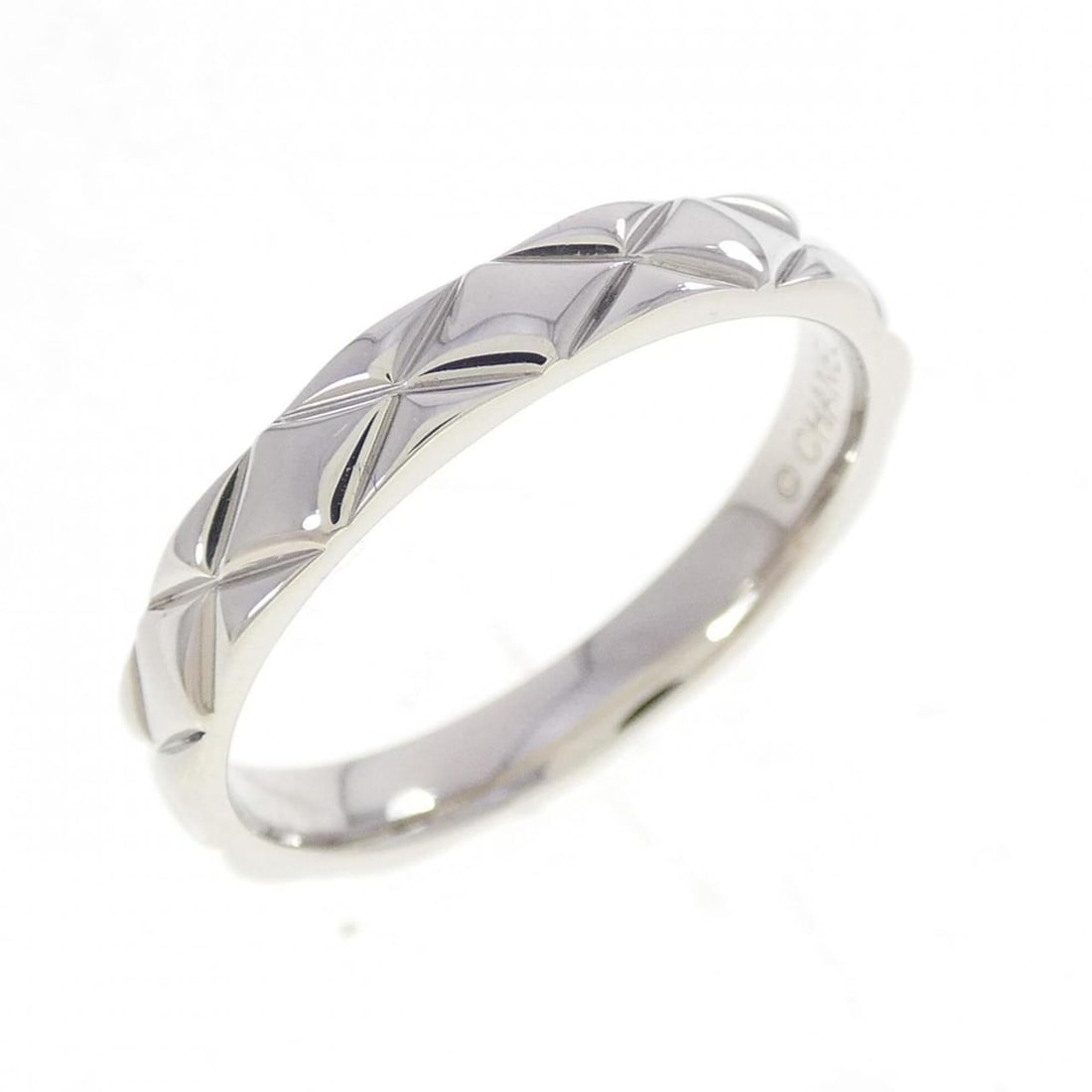 Chanel Matelassé Ring: --- Catalog ---Category: SizeJP Size: 19US Size: 9.5Category: DesignType: Band ringColor: SilverGender: WomenMaterial: Platinum 950Category: GeneralBrand: Chanel--- Item List ---Section:
