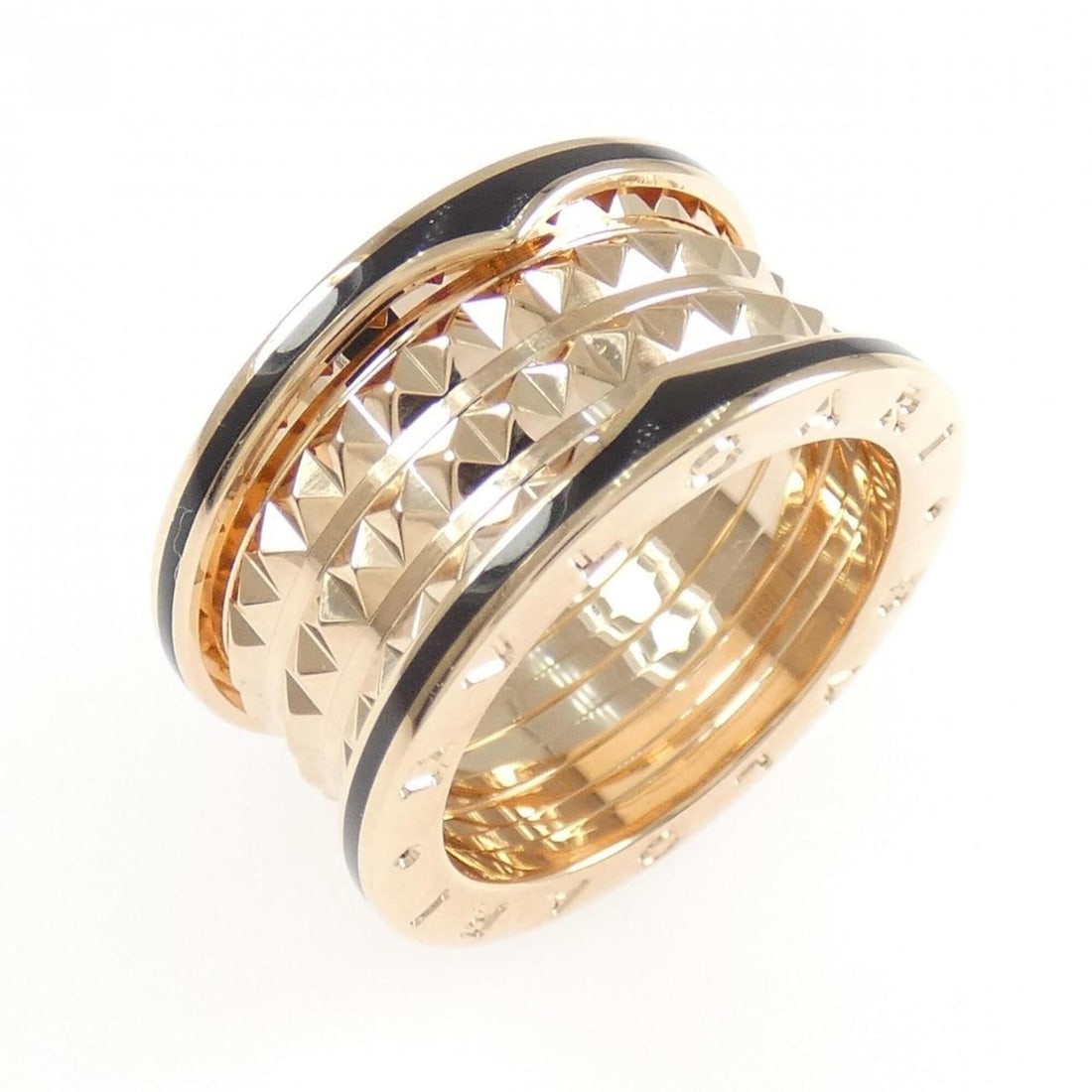 Bvlgari Bulgari B.zero1 Rock 4-Band Ring: --- Catalog ---Category: SizeJP Size: 16US Size: 8Category: DesignType: Band ringColor: Pink goldGender: WomenMaterial: Ceramic, Pink gold (18K)Category: GeneralBrand: Bvlgari--- Item List