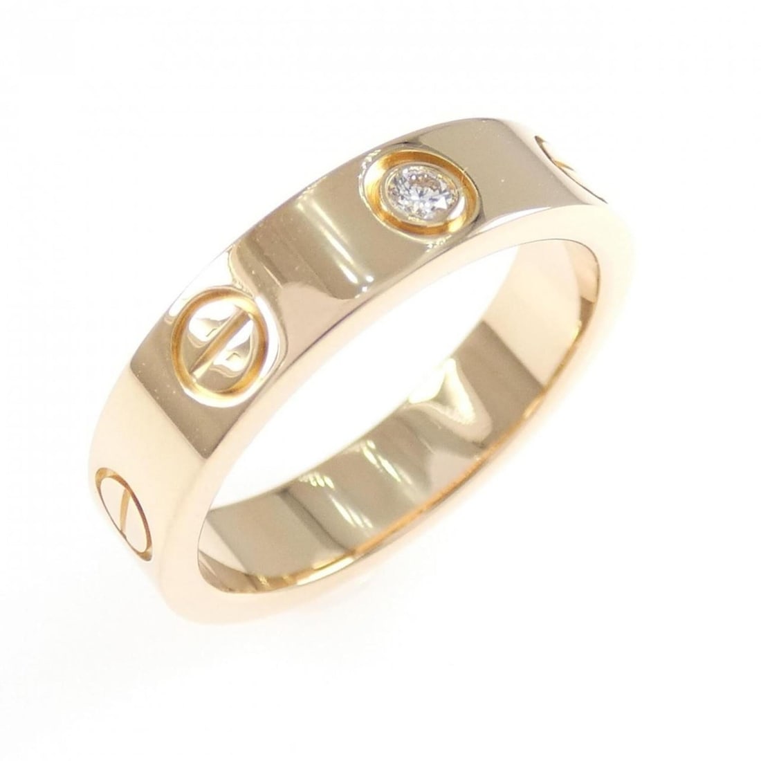 Cartier Mini Love 1P Ring: --- Catalog ---Category: SizeUS Size: 3.5Brand Size: 46Category: DesignType: Band ringGender: WomenMaterial: Pink gold (18K)Category: GeneralBrand: Cartier--- Item List ---Section: ConditionRanking: