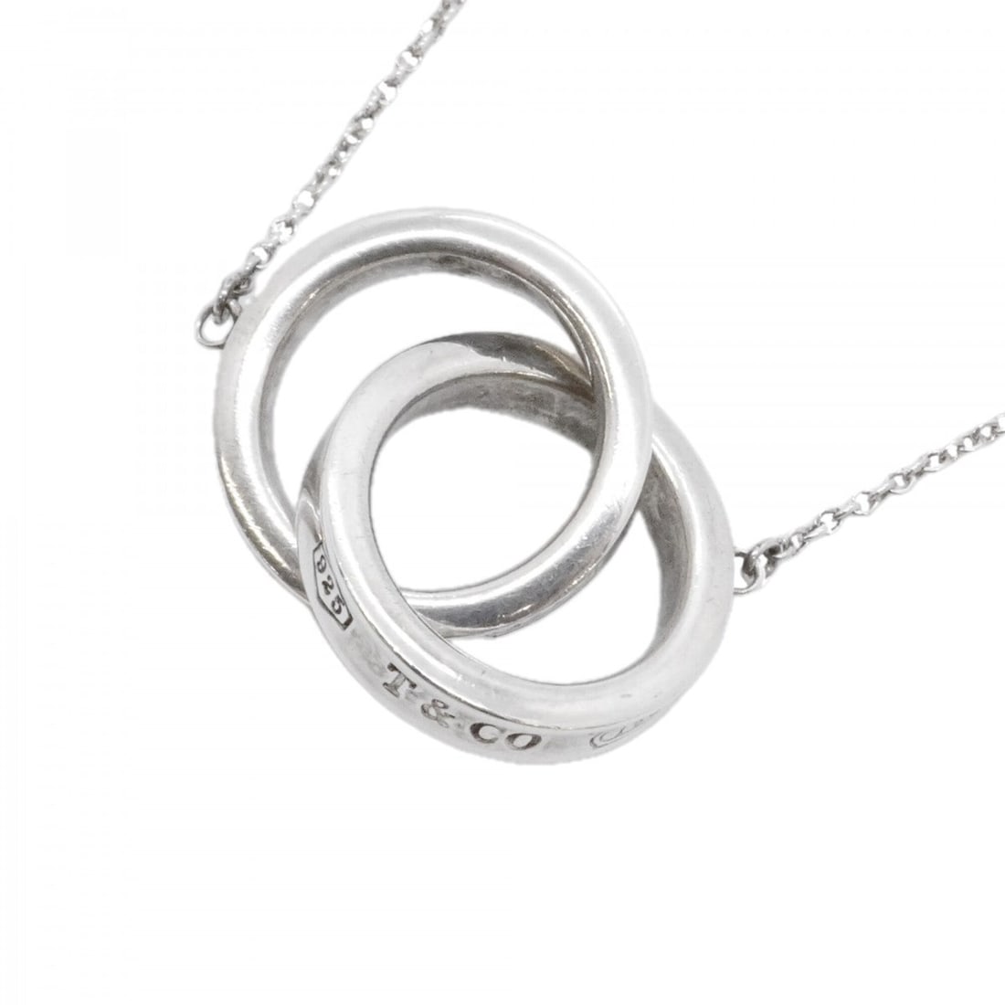 Tiffany & Co. 1837 Interlocking Necklace, Sterling Silver 925, Women's: --- Catalog ---Category: SizePendant Size: 14.2mm x 22.2mm / 0.55'' x 0.87''Neck Circumference: 40 cm / 15.74''Category: DesignGender: WomenMaterial: Silver 925Necklace Type: NecklaceCategory: General