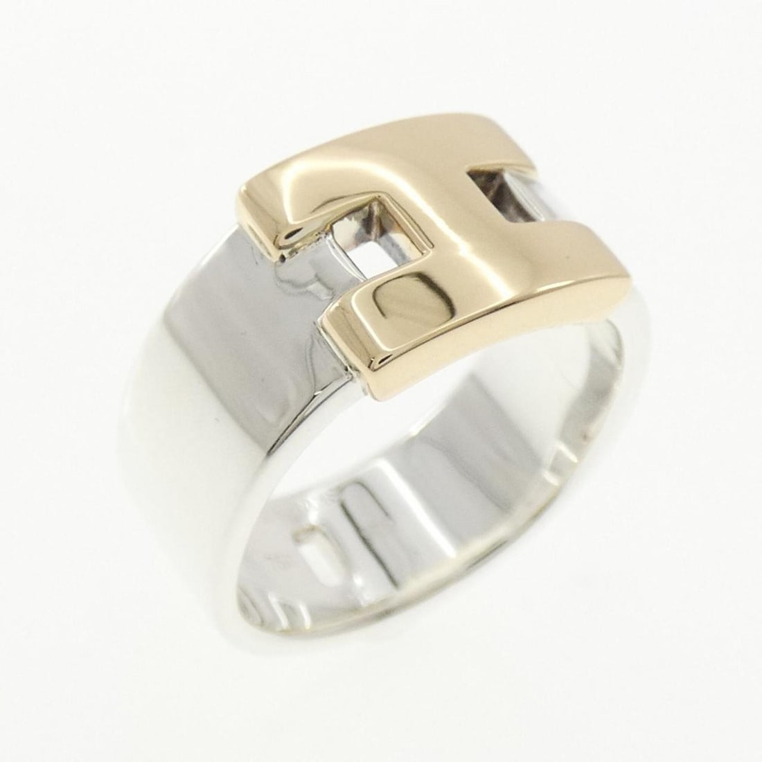 Hermes 925 750YG Ring: --- Catalog ---Category: SizeUS Size: 7Brand Size: 54Category: DesignType: Band ringGender: WomenMaterial: Silver 925, Yellow gold (18K)Category: GeneralBrand: Hermes--- Item List ---Section: Conditio