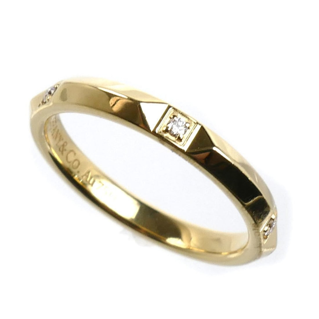 TIFFANY&Co. Tiffany 18K Yellow Gold True Band Ring with Diamonds, 3.4g, Women's: --- Catalog ---Category: SizeUS Size: 6Brand Size: 51.5Category: DesignType: Band ringStone: DiamondGender: WomenMaterial: Yellow gold (18K)Category: GeneralBrand: TiffanyCountry of Origin: USA--- Ite