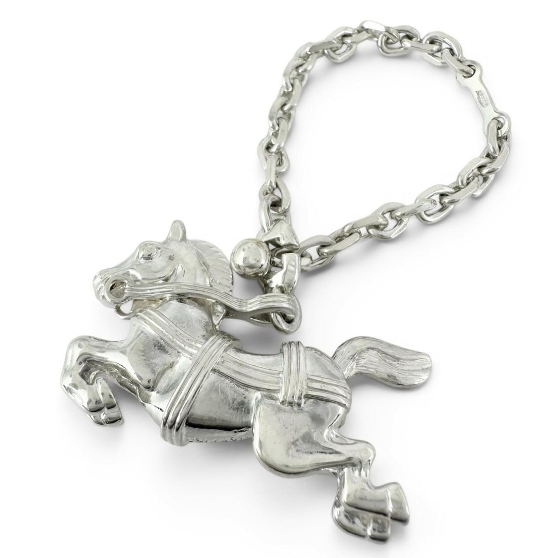 HERMES Cheval Horse Keychain Bag Charm, SV925 Silver, Weight 37.3g, Women's, with Box.: --- Catalog ---Category: SizeSize (HxWxD): 25.00mm x 40.00mm x 9.00mm / 0.98'' x 1.57'' x 0.35''Category: DesignType: Handbag charmColor: SilverGender: WomenMaterial: Silver 925Category: GeneralBrand: