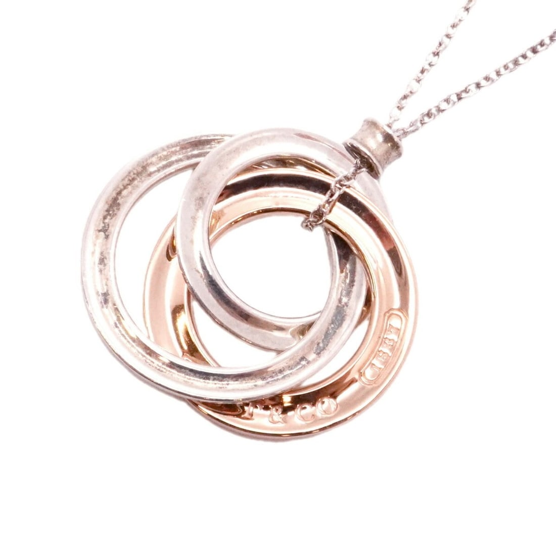 Tiffany & Co. Necklace 1837 Interlocking Sterling Silver 925 Rubedo Metal Women's: --- Catalog ---Category: SizePendant Size: 24.7mm x 23.1mm / 0.97'' x 0.9''Neck Circumference: 44 cm / 17.32''Category: DesignGender: WomenMaterial: Silver 925Necklace Type: NecklaceCategory: GeneralB