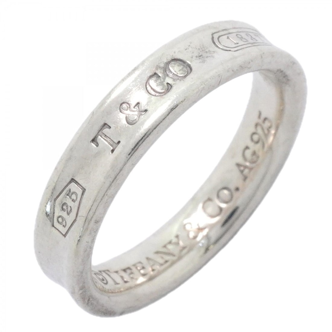 Tiffany & Co. Narrow Sterling Silver Ring, Size 10 (Women's): --- Catalog ---Category: SizeJP Size: 10US Size: 5.5Category: DesignType: Band ringGender: WomenMaterial: Silver 925Category: GeneralBrand: Tiffany--- Item List ---Section: ConditionRanking: Rank AB U