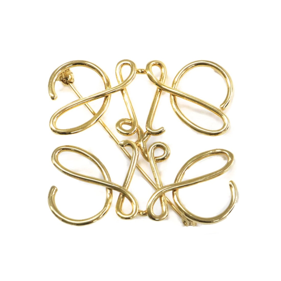 LOEWE Anagram Brooch, Metal, Brass, Gold, Women's: --- Catalog ---Category: SizeSize (HxWxD): 5cm x 5.3cm / 1.96'' x 2.08''Category: DesignType: BroochColor: GoldGender: WomenMaterial: BrassCategory: GeneralBrand: LoeweCountry of Origin: Spain--- Item