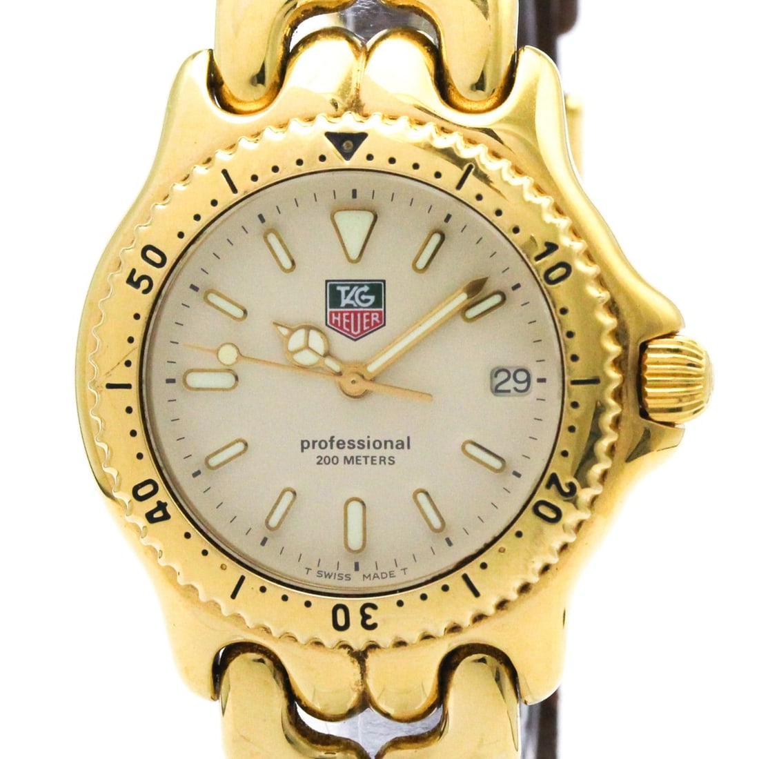 TAG HEUER Sel Professional Gold Plated Quartz Mid Size Watch S94.013K: --- Catalog ---Category: SizeCase Diameter: 34mm / 1.34''Category: DesignType: WristwatchStyle: SportGender: BoysColor (Dial): IvoryMaterial (Band): LeatherMaterial (Case): Gold platedCategory: Genera