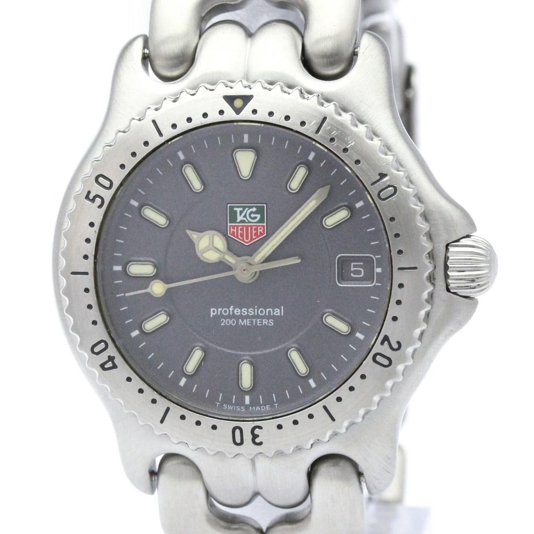 TAG HEUER Sel Professional 200M Quartz Mid Size Watch WG1213 Polished: --- Catalog ---Category: SizeCase Diameter: 34mm / 1.34''Category: DesignType: WristwatchStyle: Dress/FormalGender: MenColor (Dial): GrayMaterial (Band): Stainless steelMaterial (Case): Stainless stee
