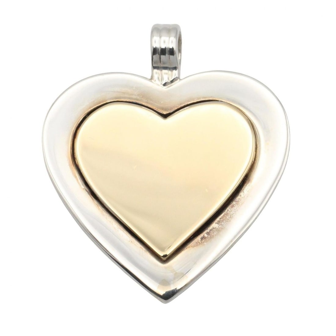 Tiffany & Co. Heart Pendant Top - 18K (Yellow Gold) Stainless Steel Women's Silver/Gold Tone: --- Catalog ---Category: SizeWeight: 9.9g / 0.34oz.Pendant Size: 31.3mm x 26mm / 1.23'' x 1.02''Category: DesignColor: YellowMetal: GoldGender: WomenMaterial: Stainless steelMetal Purity: 18KPendant T