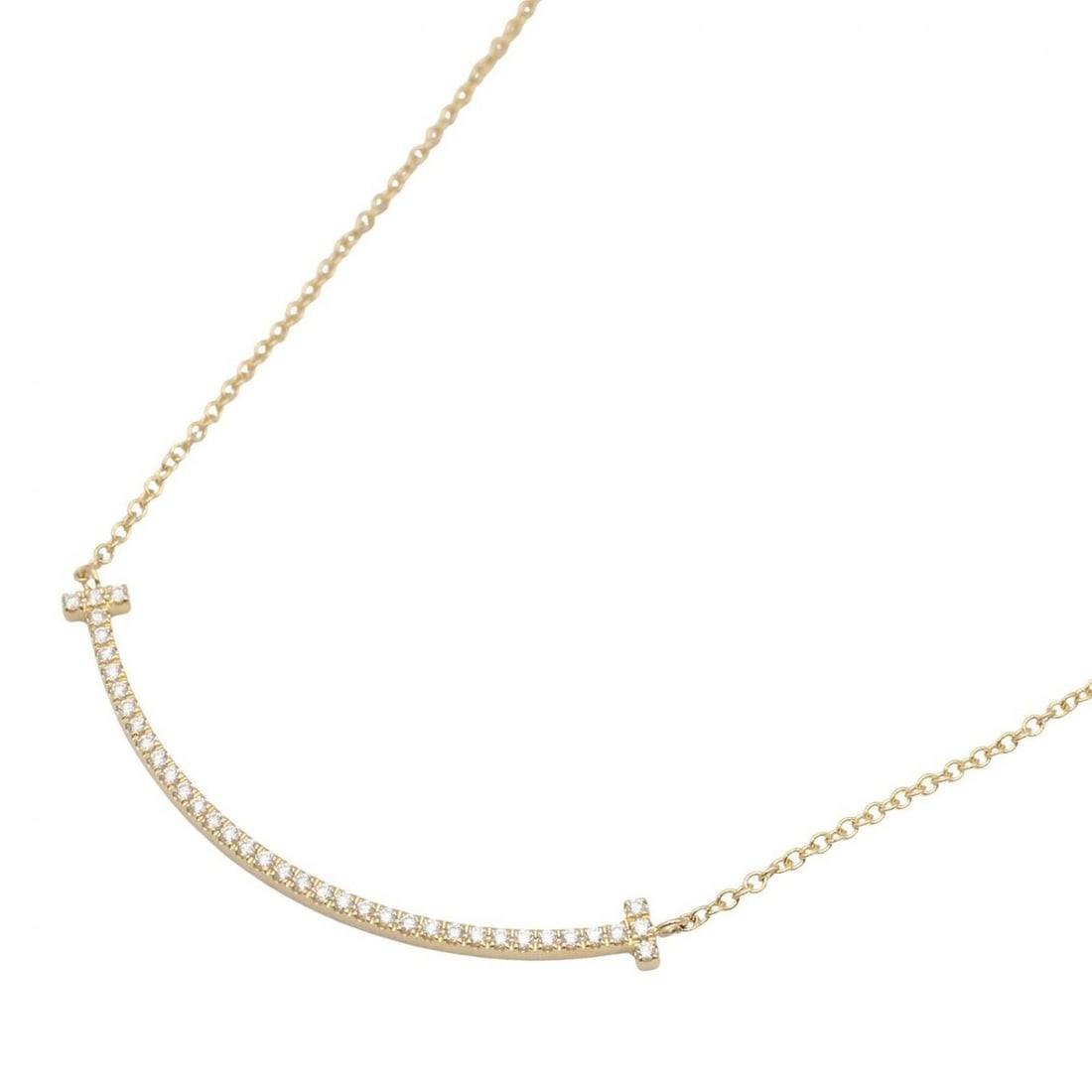 Tiffany & Co. T Smile Small Diamond Necklace, 18K (Yellow Gold), Diamond, Women's, Clear/Gold Tone: --- Catalog ---Category: SizeWeight: 2.4g / 0.08oz.Pendant Size: 3.5mm x 37mm / 0.13'' x 1.45''Neck Circumference: 40.5 cm / 15.94''Category: DesignColor: YellowMetal: GoldStone: DiamondGender: WomenM