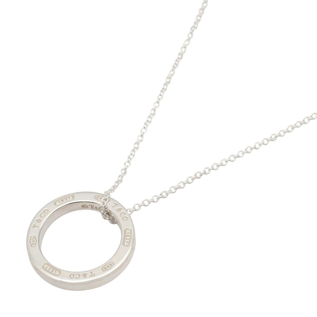 Tiffany & Co. 1837 Circle Necklace, Sterling Silver 925, Tone, for Men and Women: --- Catalog ---Category: SizeWeight: 4g / 0.14oz.Diameter: 17.6mm / 0.69''Neck Circumference: 40.5 cm / 15.94''Category: DesignMetal: SilverGender: Men,WomenMetal Purity: Silver925Necklace Type: Neckl